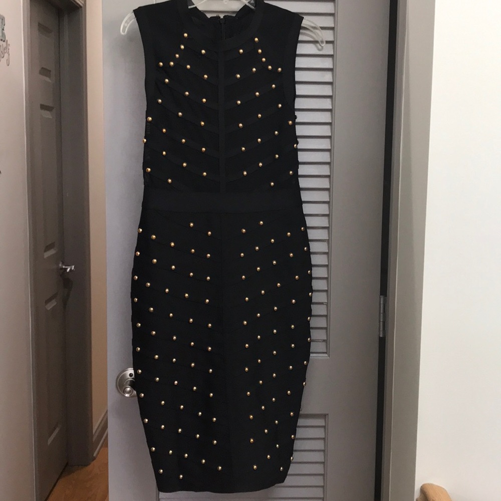 Little black dress with gold accents